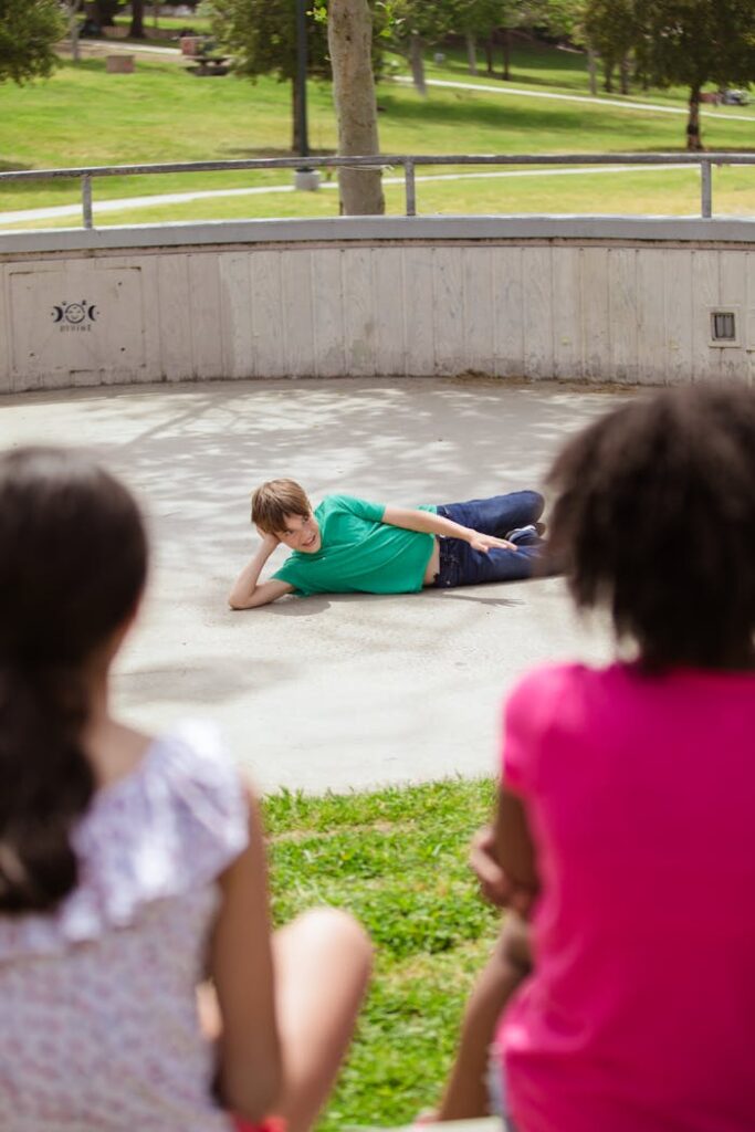Teens enjoy leisure time at a sunny park with playful activities.